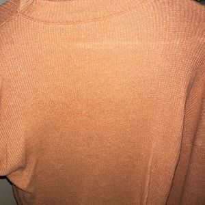 Faded orange turtleneck
